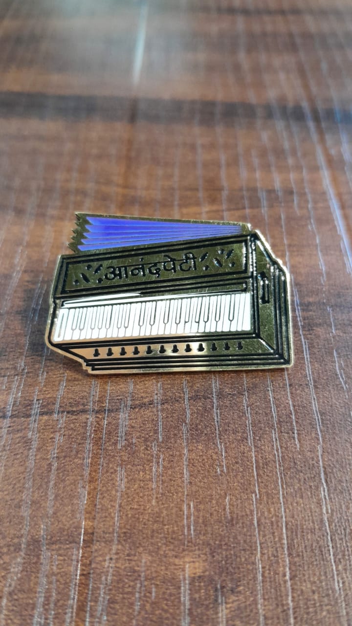 Harmonium Pin